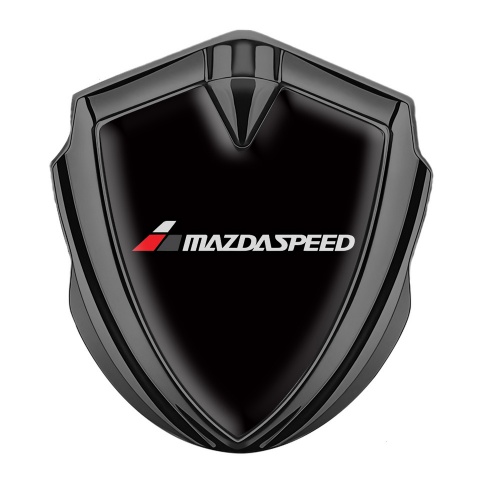 Mazda Speed Abzeichen selbstklebend Graphit Tonfarbe mit Schwarz Fundament und Grau inschrift