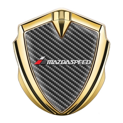 Mazda Seitenflugel Emblem Aufkleber Goldtonfarbe mit Carbon Fundament und Grau Logo