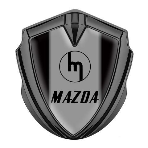 Mazda Emblem Abzeichen Graphit Tonfarbe mit Schwarz Vorlage und Retro Logo Stil