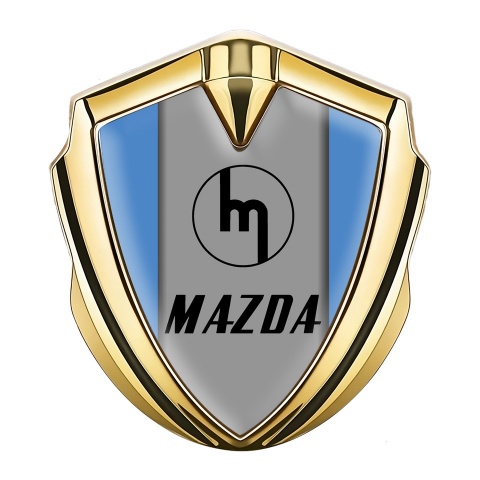 Mazda Seitenflugel Emblem Aufkleber Goldtonfarbe mit Blau Hintergrund und Retro Logo