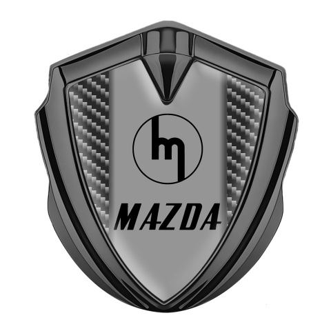 Mazda Abzeichen selbstklebend Graphit Tonfarbe mit Dunkles Carbon Basis und Retro Logo Stil