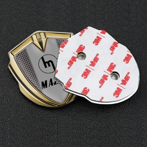 Mazda Emblem Abzeichen selbstklebend Goldtonfarbe mit Braun Carbon und Retro Logo