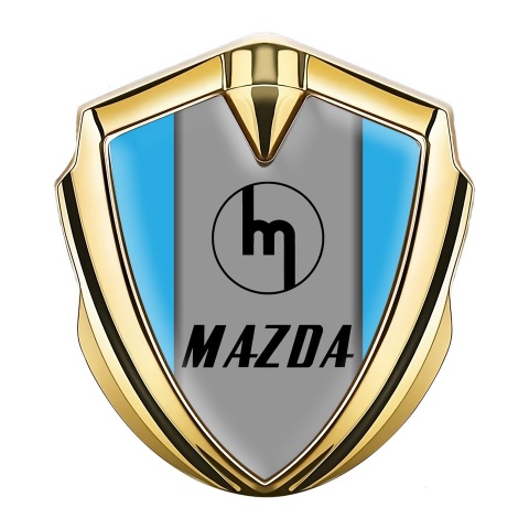 Mazda Seitenflugel Emblem Aufkleber Goldtonfarbe mit Himmelblau Basis und Retro Logo