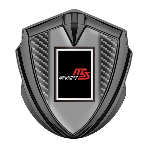 Mazda Speed Abzeichen selbstklebend Graphit Tonfarbe mit Dunkles Carbon und Rechteckiges Logo Stil