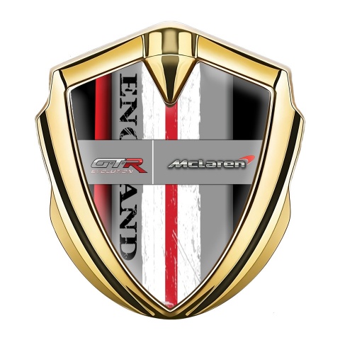 Mclaren GTR Emblem Abzeichen Goldtonfarbe Schwarz Basis mit Rote Band England Logo Stil
