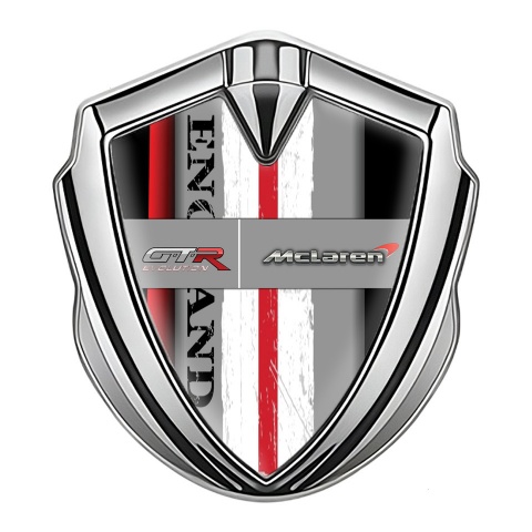Mclaren GTR Emblem Abzeichen Silbertonfarbe Schwarz Basis mit Rote Band England Logo Stil