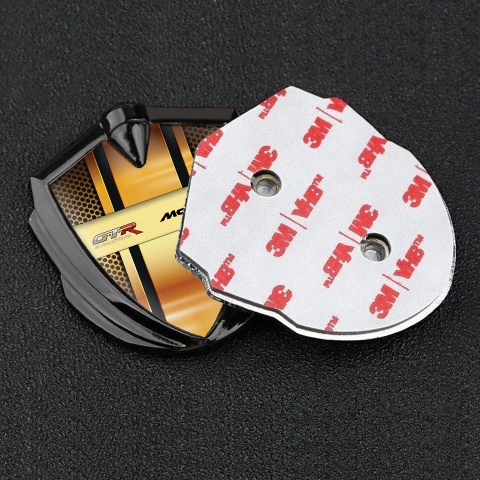 Mclaren GTR Emblem Abzeichen Graphit Tonfarbe Gelb Gitter Design