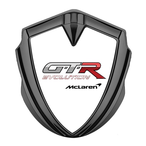Mclaren GTR Seitenflugel Emblem Aufkleber Graphit Tonfarbe Weiss Print Evolution Logo stil