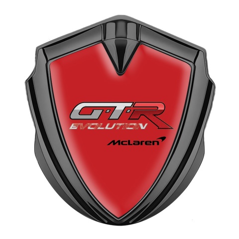 Mclaren GTR Emblem Abzeichen Graphit Tonfarbe Rote Print Evolution logo