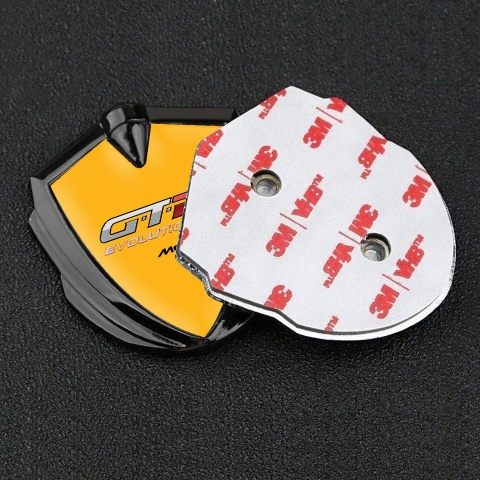 Mclaren GTR Abzeichen selbstklebend Graphit Tonfarbe Orange Basis Evolution logo