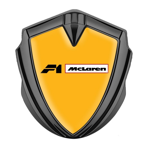 Mclaren Emblem Abzeichen Graphit Tonfarbe Orange Hintergrund F1 Logo