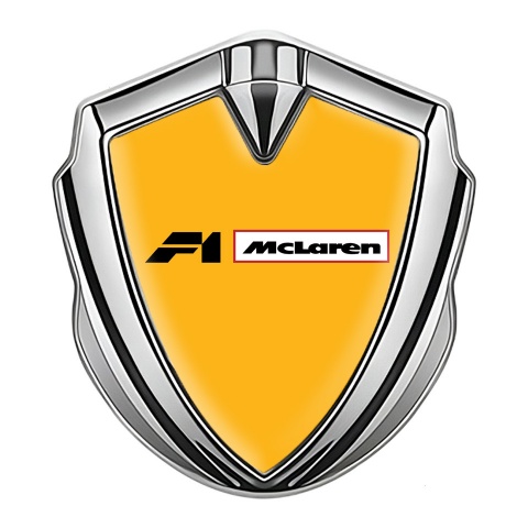 Mclaren Emblem Abzeichen Silbertonfarbe Orange Hintergrund F1 Logo
