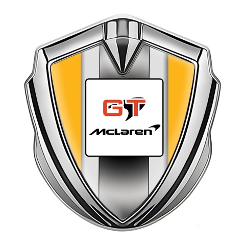 Mclaren Abzeichen selbstklebend Silbertonfarbe Orange Basis mit GT Logo Stil