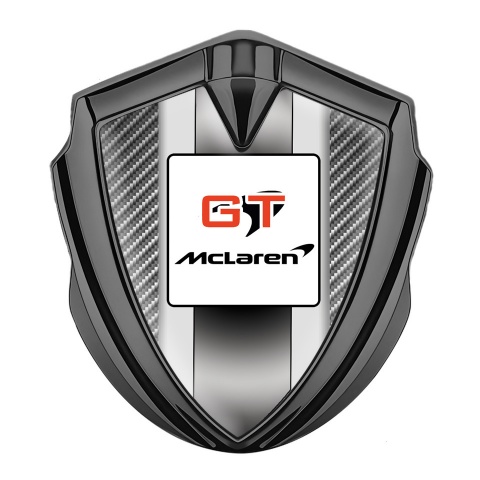 Mclaren Emblem Abzeichen selbstklebend  Graphit Tonfarbe Grau Carbon GT Logo Stil