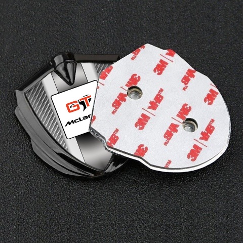 Mclaren Emblem Abzeichen selbstklebend  Graphit Tonfarbe Grau Carbon GT Logo Stil