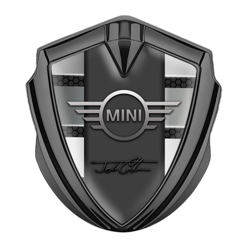 Mini Cooper Abzeichen selbstklebend Graphit Tonfarbe mit Blindeffekt und John Cooper Unterschrift