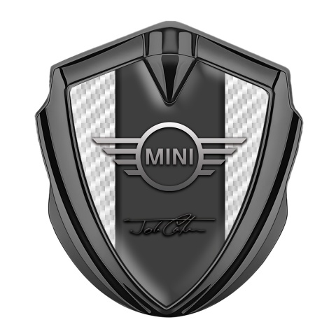 Mini Cooper Emblem Abzeichen selbstklebend Graphit Tonfarbe mit Weiss Kohlenstoff Basis und John Cooper Unterschrift
