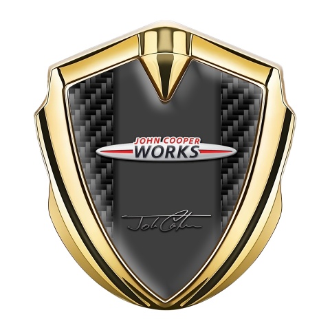 Mini Cooper Abzeichen selbstklebend Goldtonfarbe mit Kohlenstoff Hintergrund John Cooper Works Logo