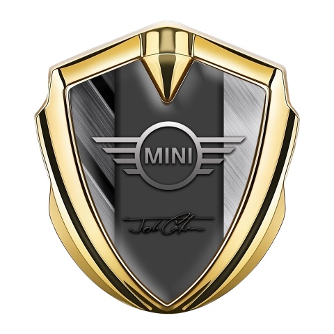 Mini Cooper Emblem Abzeichen selbstklebend Goldtonfarbe mit Teller in Grautönen Design und Cooper Unterschrift