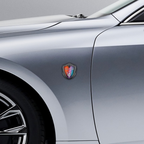 Maserati Emblem Abzeichen Graphit Tonfarbe mit Farbexplosion Design Basis