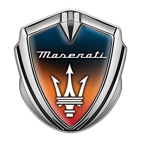 Maserati Emblem Abzeichen selbstklebend Silbertonfarbe mit Irisierende orange blaue Basis Stil