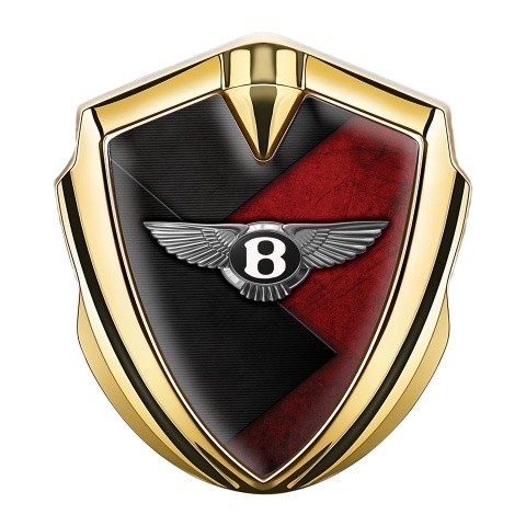 Bentley Selbstklebendes Metallaufkleber Emblem Goldtonfarbe mit Schwarz Rote Textur Hintergrund