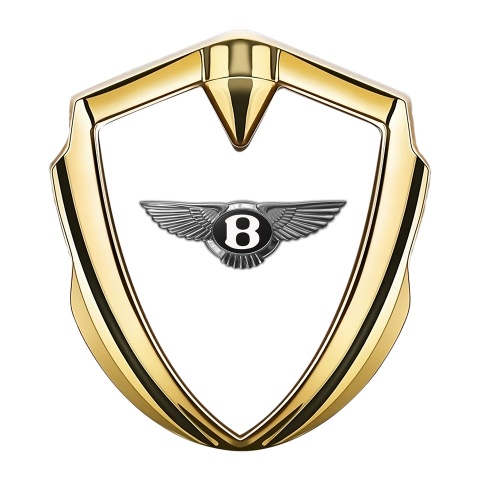 Bentley Abzeichen selbstklebend Goldtonfarbe mit Weiss Hintergrund und Grau Weiss Logo