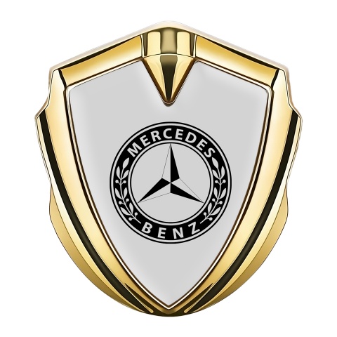 Mercedes Benz Emblem Abzeichen Goldtonfarbe mit Grau Basis und Rundes Logo Stil