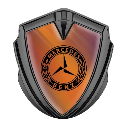 Mercedes Benz Emblem Logo Schriftzug Aufkleber mit Graphit Tonfarbe Orange Hintergrund
